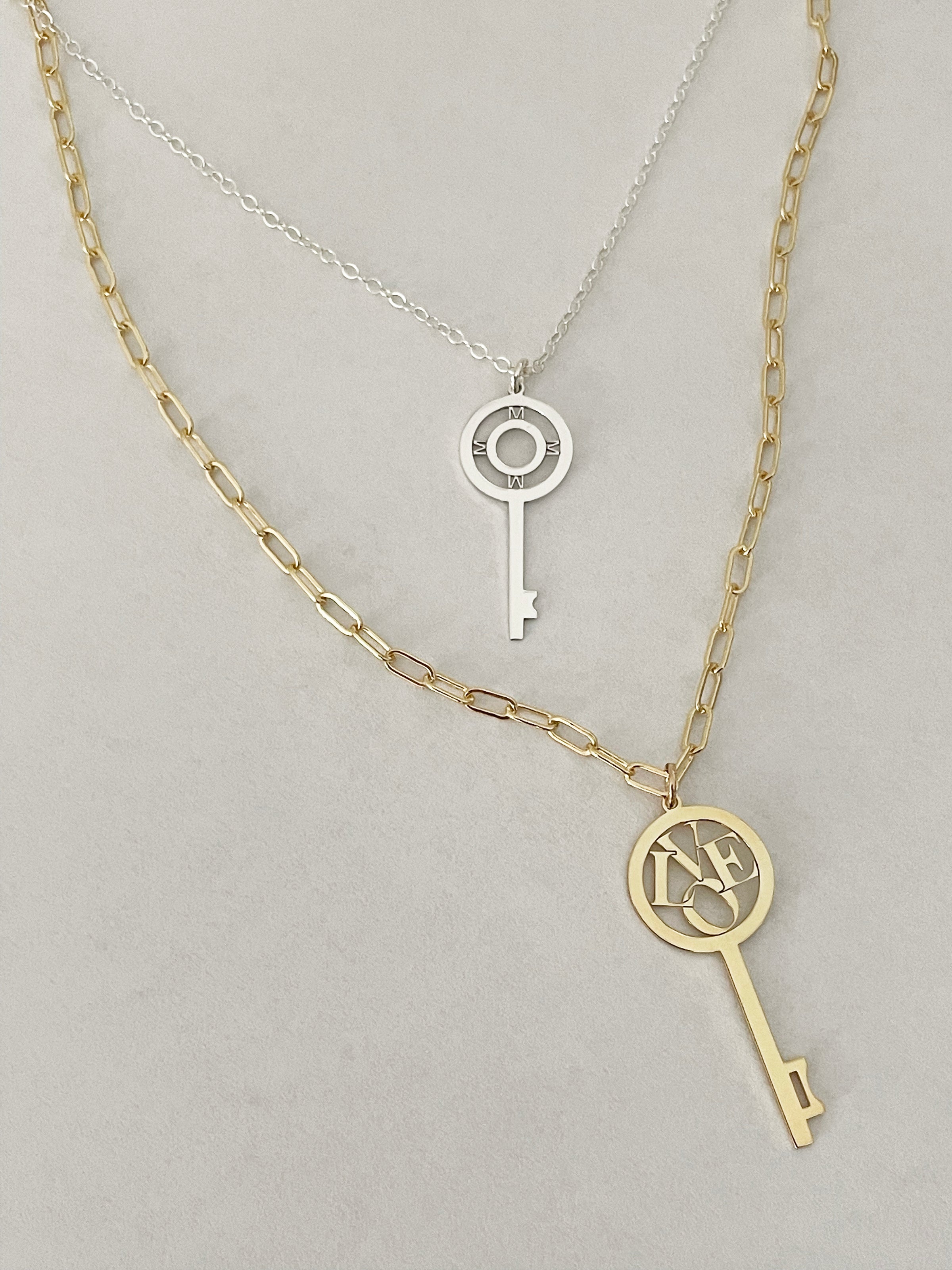 Love key pendant in gold